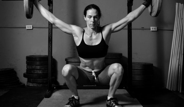 HIT Training for Women Woman Lifting Barbell