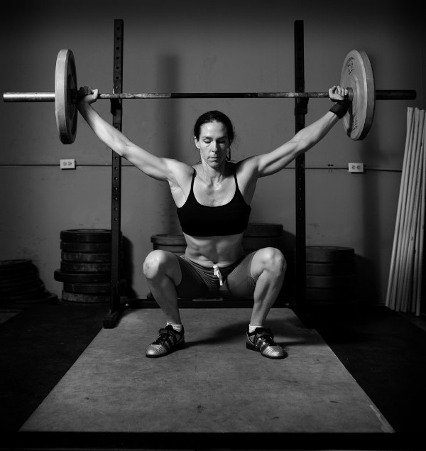 Woman Lifting Barbell